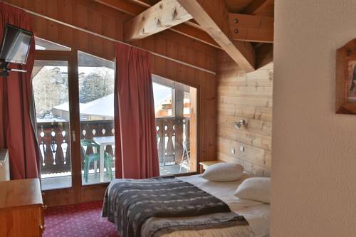 Imagen de la habitación del Hotel Club Le Crêt. Foto 3