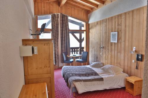 Imagen de la habitación del Hotel Club Le Crêt. Foto 5