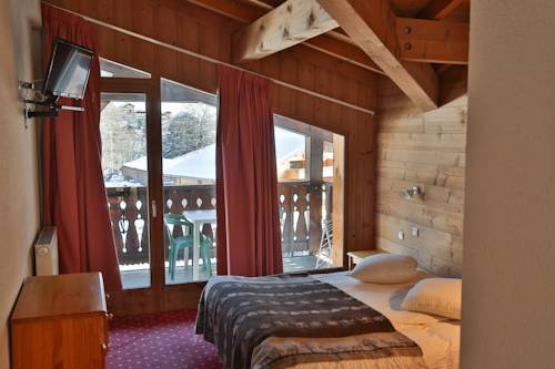 Imagen de la habitación del Hotel Club Le Crêt. Foto 7