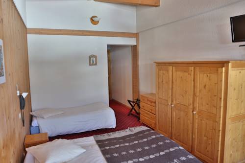 Imagen de la habitación del Hotel Club Le Crêt. Foto 9