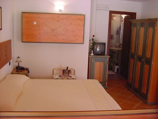 Imagen de la habitación del Hotel Club Le Rose. Foto 7