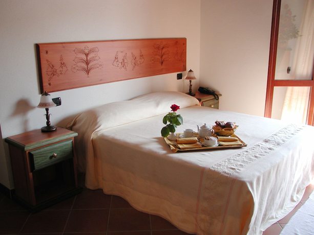 Imagen de la habitación del Hotel Club Le Rose. Foto 13