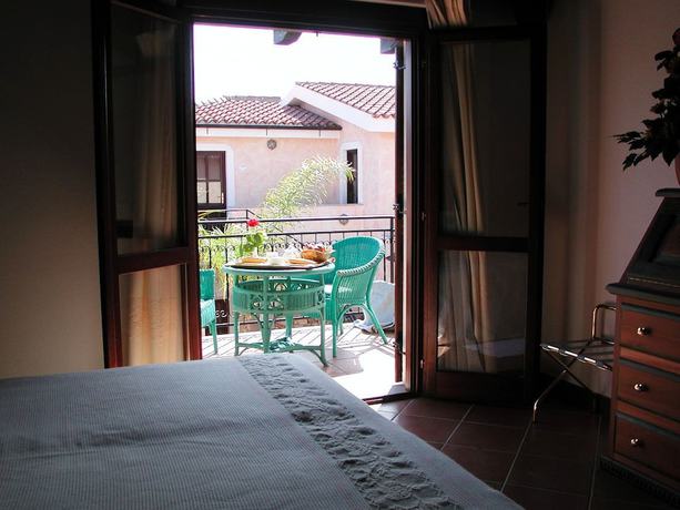 Imagen de la habitación del Hotel Club Le Rose. Foto 15