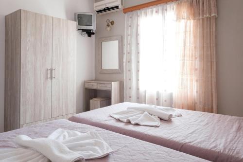 Imagen de la habitación del Hotel Club Maria Sidari. Foto 16