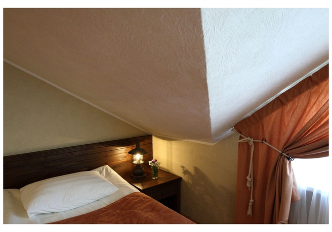 Imagen de la habitación del Hotel Club Marinn Mini-hotel. Foto 5