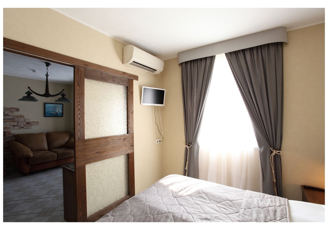 Imagen de la habitación del Hotel Club Marinn Mini-hotel. Foto 8