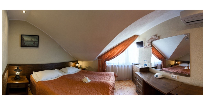 Imagen de la habitación del Hotel Club Marinn Mini-hotel. Foto 12