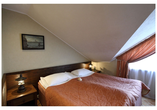 Imagen de la habitación del Hotel Club Marinn Mini-hotel. Foto 13