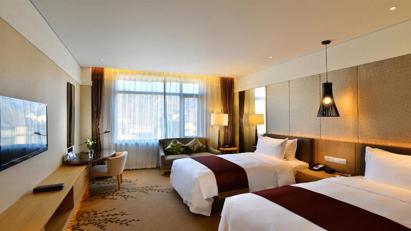 Imagen de la habitación del Hotel Club Med Joyview Beijing Yanqing Resort. Foto 6