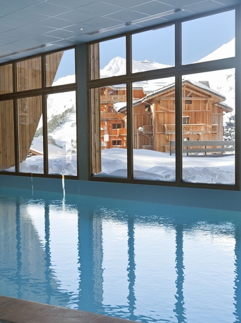 Imagen de la piscina del Hotel Club Mmv Altitude Arc 2000. Foto 15