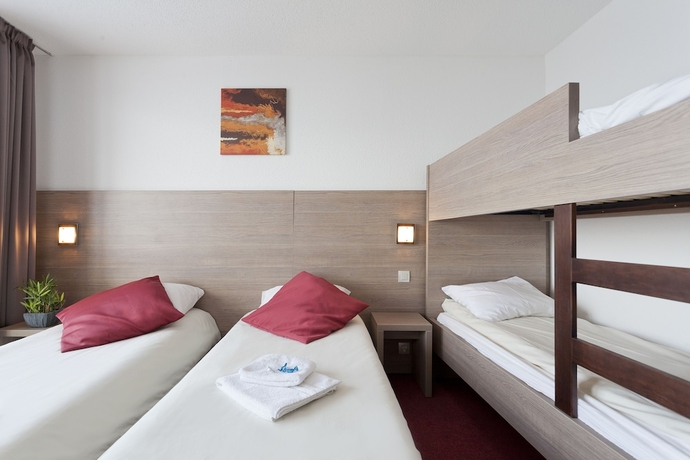 Imagen de la habitación del Hotel Club Mmv Les M&eacute;l&egrave;zes Arc 2000. Foto 5