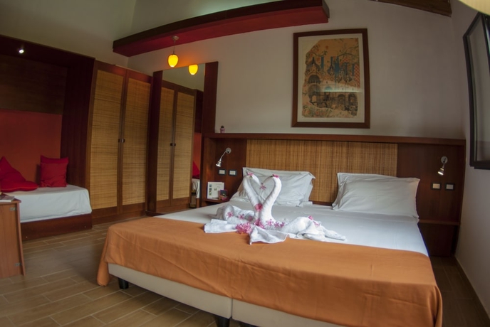 Imagen de la habitación del Hotel Club Nature Village. Foto 8