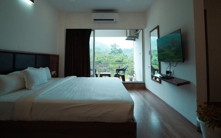 Imagen de la habitación del Hotel Club Nirvana Boutique Resort Pure-Veg. Foto 3