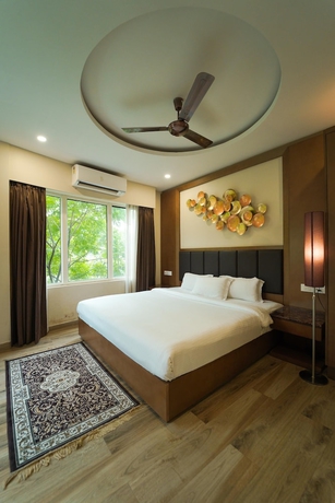 Imagen de la habitación del Hotel Club Nirvana Boutique Resort Pure-Veg. Foto 8