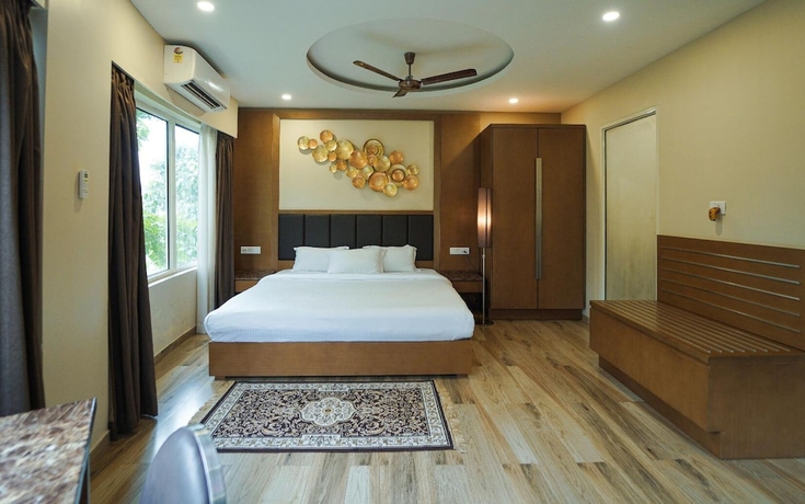 Imagen de la habitación del Hotel Club Nirvana Boutique Resort Pure-Veg. Foto 11