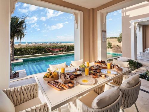 Imagen de la habitación del Hotel Club Privé By Rixos Saadiyat Island. Foto 18