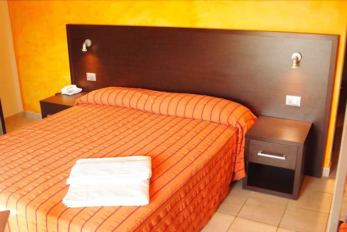 Imagen de la habitación del Hotel Club Ravezzo, Lido Marini. Foto 7