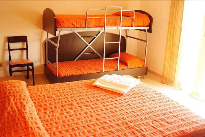 Imagen de la habitación del Hotel Club Ravezzo, Lido Marini. Foto 9