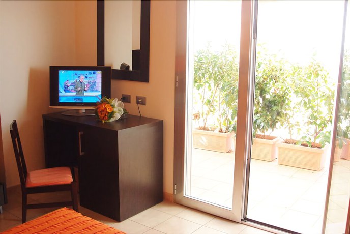 Imagen de la habitación del Hotel Club Ravezzo, Lido Marini. Foto 13