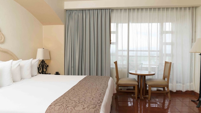 Imagen de la habitación del Hotel Club Regina Puerto Vallarta. Foto 12