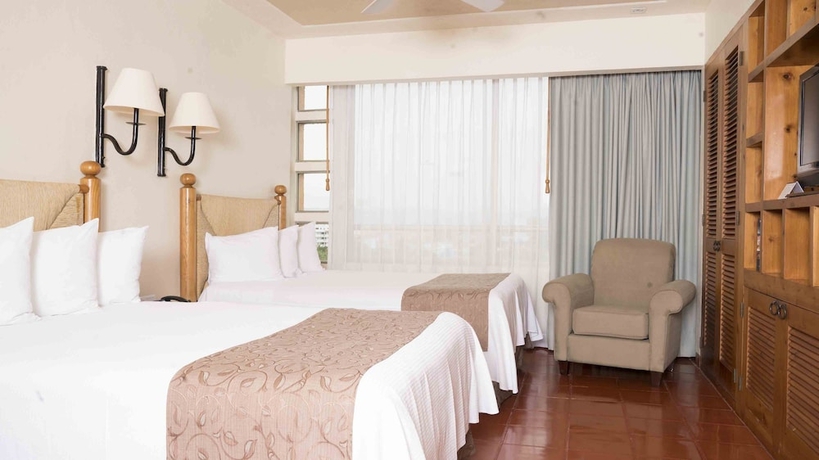 Imagen de la habitación del Hotel Club Regina Puerto Vallarta. Foto 13