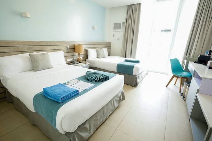 Imagen de la habitación del Hotel Club Samal Resorts Development Inc. Foto 25