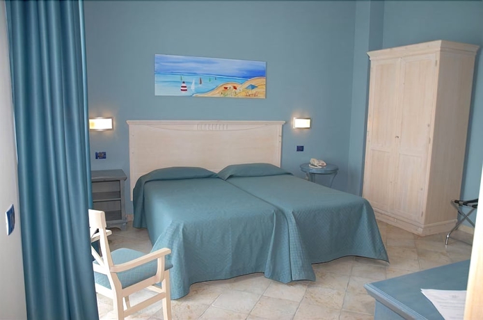 Imagen de la habitación del Hotel Club Selinunte Beach Aimori. Foto 7