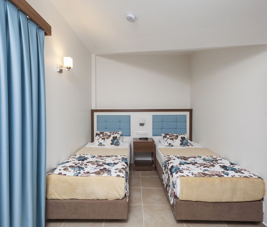 Imagen de la habitación del Hotel Club Tuana Fethiye. Foto 2