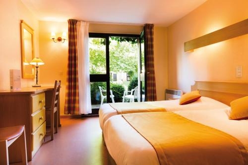 Imagen de la habitación del Hotel Club Vacances Bleues Domaine De Ch&acirc;teau Laval. Foto 6