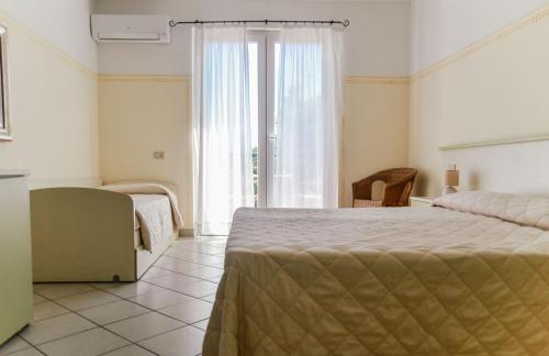 Imagen de la habitación del Hotel Club i Pini - Residenza d\'Epoca in Versilia. Foto 8