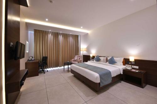 Imagen de la habitación del Hotel Clubhouse Morbi, Lalpar. Foto 19