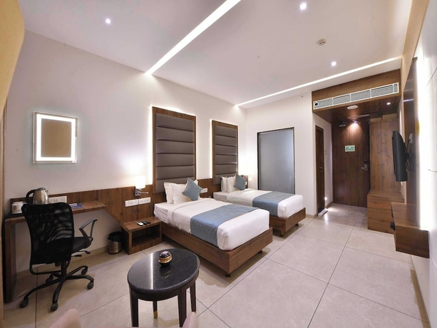 Imagen de la habitación del Hotel Clubhouse Morbi, Morvi. Foto 10