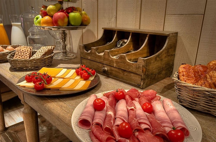 Imagen del bar/restaurante del Hotel Cluny Square. Foto 2