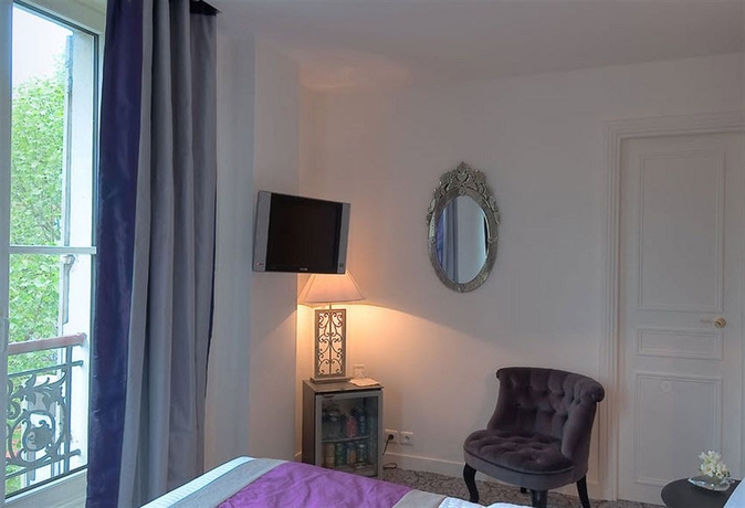 Imagen de la habitación del Hotel Cluny Square. Foto 5