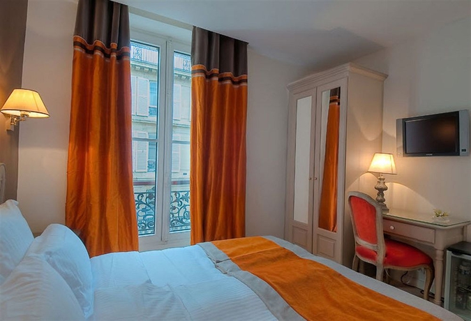 Imagen de la habitación del Hotel Cluny Square. Foto 9