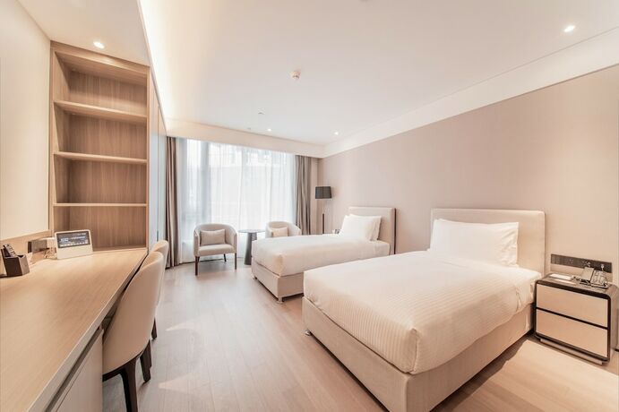 Imagen de la habitación del Hotel Cm Service Apartment Suzhou. Foto 20