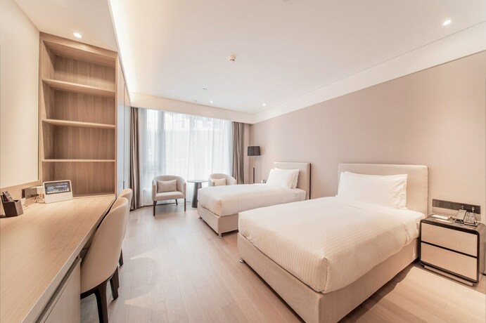 Imagen de la habitación del Hotel Cm Service Apartment Suzhou. Foto 22