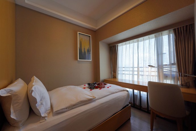 Imagen de la habitación del Hotel Cm Serviced Apartment Shekou. Foto 6