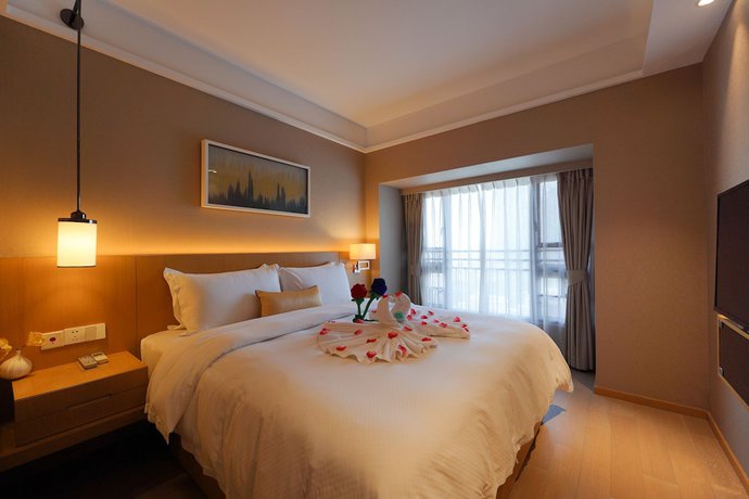 Imagen de la habitación del Hotel Cm Serviced Apartment Shekou. Foto 11