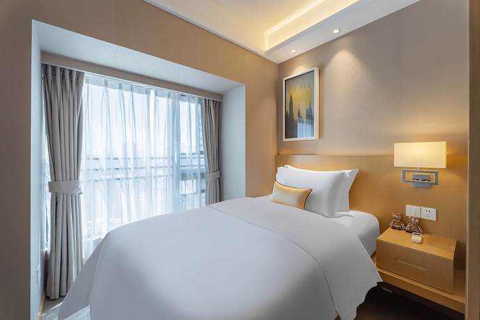 Imagen de la habitación del Hotel Cm Serviced Apartment Shekou. Foto 13