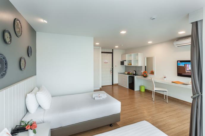 Imagen de la habitación del Hotel Cmor Hotel Chiang Mai. Foto 11