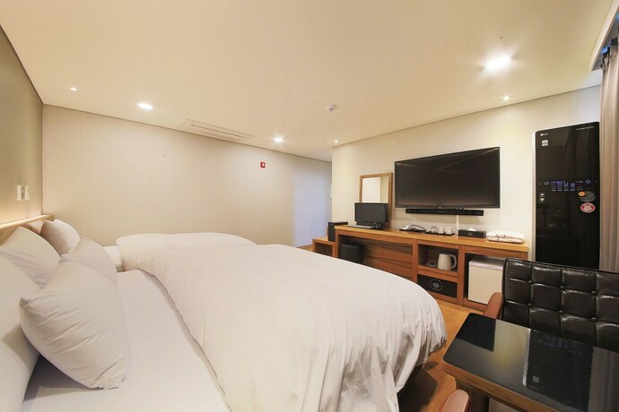 Imagen de la habitación del Hotel Cnc 1St Street Hotel. Foto 21