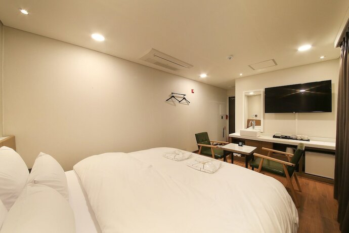 Imagen de la habitación del Hotel Cnc 1St Street Hotel. Foto 30