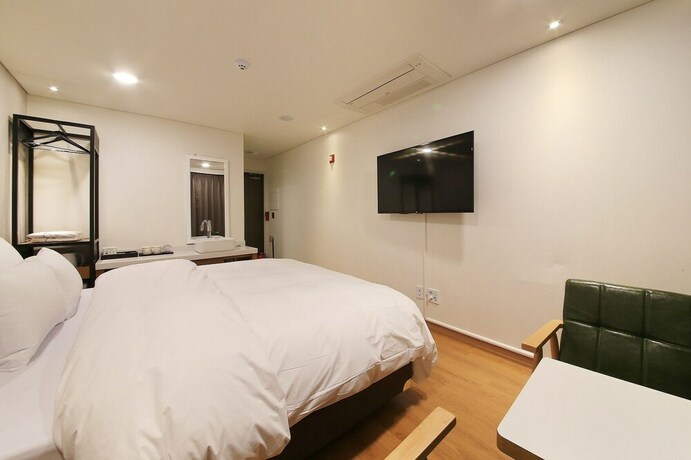 Imagen de la habitación del Hotel Cnc 1St Street Hotel. Foto 35