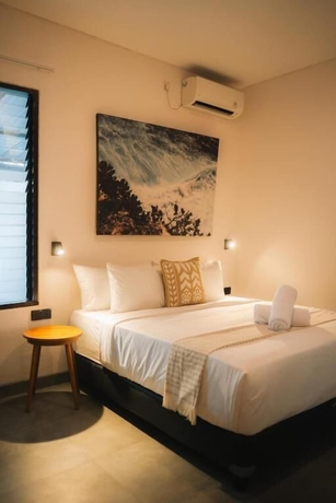 Imagen de la habitación del Hotel Co Day Uluwatu. Foto 2
