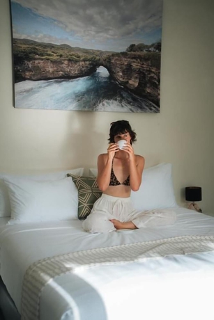 Imagen de la habitación del Hotel Co Day Uluwatu. Foto 3