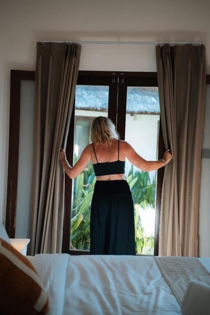 Imagen de la habitación del Hotel Co Day Uluwatu. Foto 6