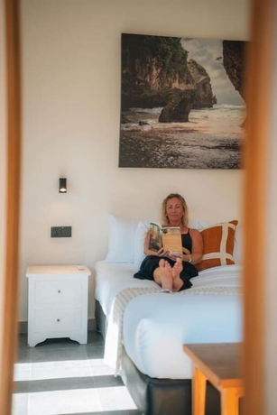 Imagen de la habitación del Hotel Co Day Uluwatu. Foto 10