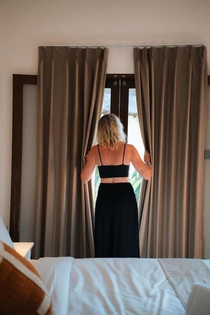 Imagen de la habitación del Hotel Co Day Uluwatu. Foto 13