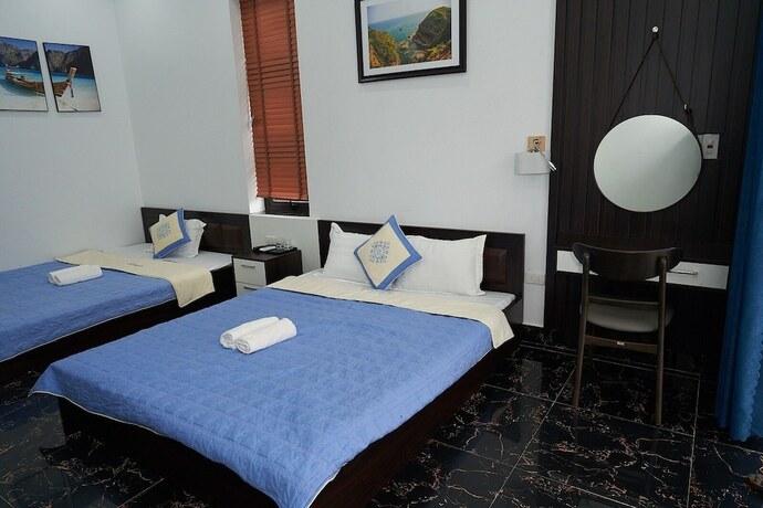 Imagen de la habitación del Hotel Co To Center Homestay. Foto 22